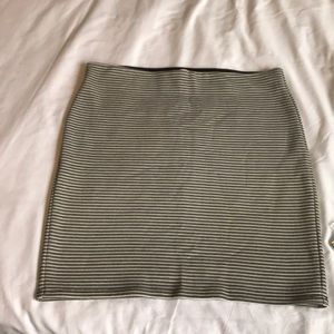 Tight black and white striped skirt